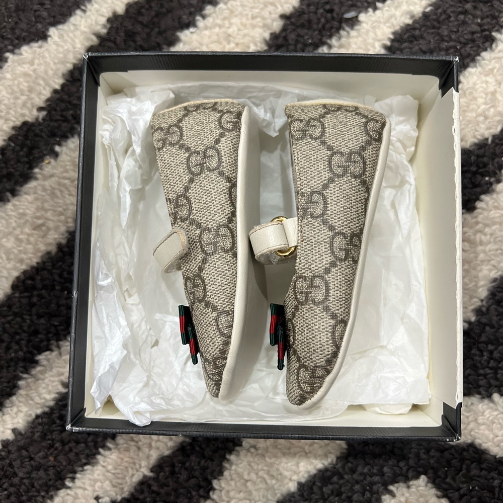 Gucci baby shoes.